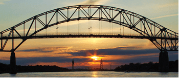 bridge over water at sunset