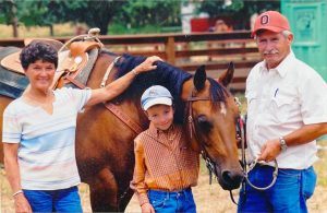 Cole with his horse, Tuck, and his grandparents, Jim and Meryle Johnston, in 2007