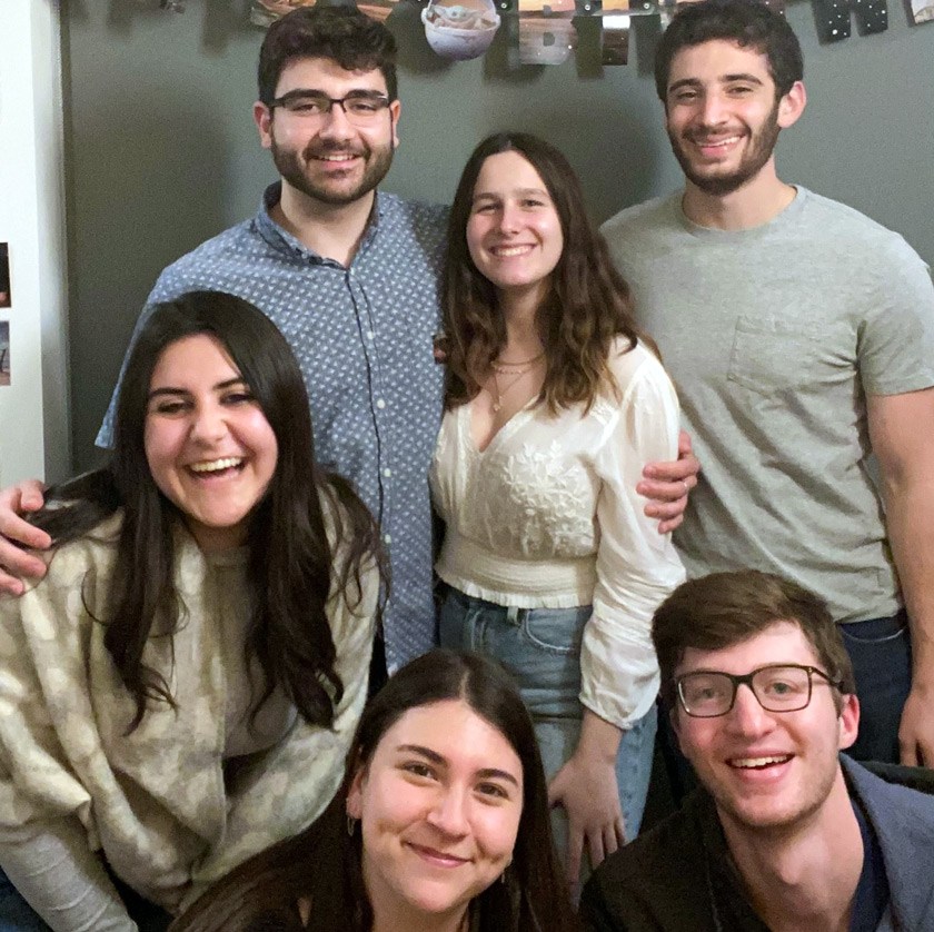 John celebrating his second pandemic birthday in Ithaca in 2021. Front row L to R: Natalie Sullivan Baker ’22, Shayna Hochberger ’21, Mike Gelb ’21; Back row L to R: John Sullivan Baker ’20, Alexis Fintland ’22, Jason Katz ’21