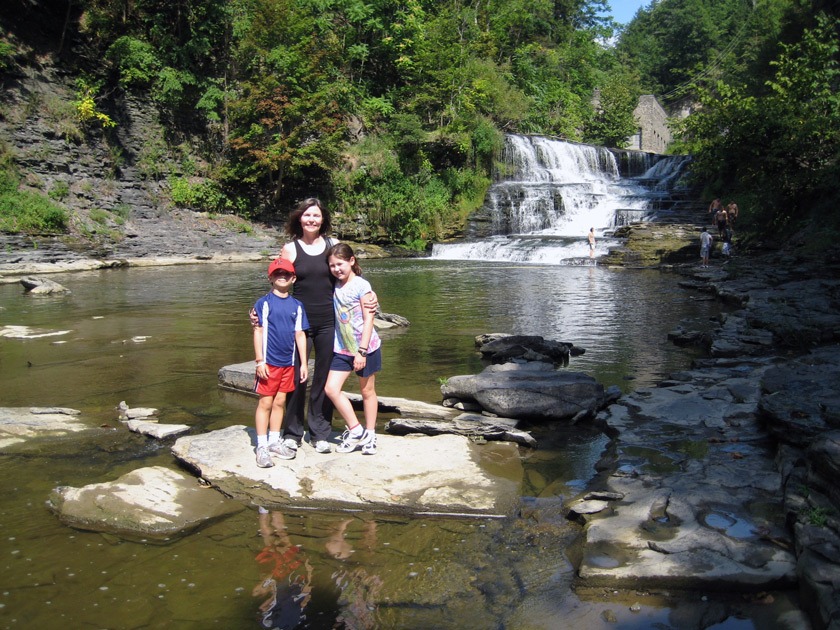 Renata Geer ’82 with her children Lukas and Maya in Fall Creek gorge during a 2010 visit to campus