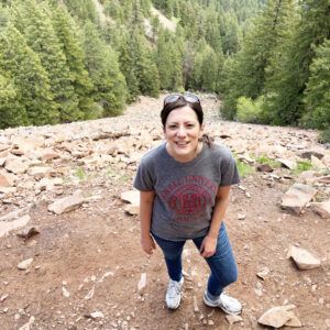 Alexandra Cirone hiking in Denver, wearing a Cornell t-shirt