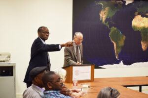 Muna Ndulo moderating a pre-pandemic seminar at Cornell Law School