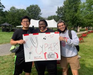 Winston Lam ’23, Marissa Rice PhD ’21, and Eitan Wolf ’22 tabling for CU Cyphers at ClubFest 2021