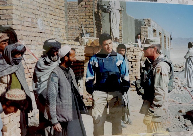 Farid translating for a school reconstruction team in Gardez, Afghanistan in 2003