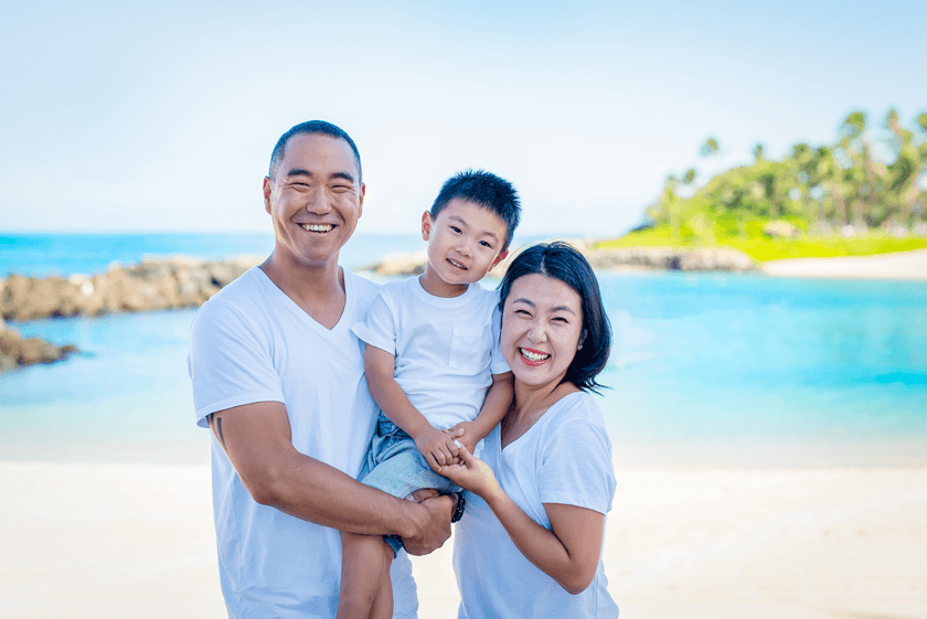 Will Yoon ’01, Renee Choi ’06, and their son, Liam.