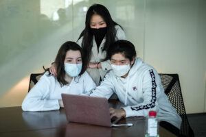 (L to R) Yagmur Dulger ’22, Jessica Yuan ’22, and Jonathan Lee ’22 run test cases for Nexus software code.