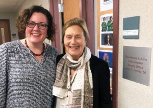 Cheryl Stanley (left), senior lecturer in the Nolan School, and Mike’s mother Elyse Harney outside the office named in honor of Mike’s father, John Harney ’56