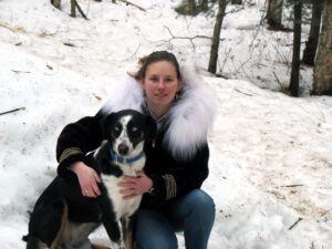 Heather with her young Saluki-mix sled dog, Helix