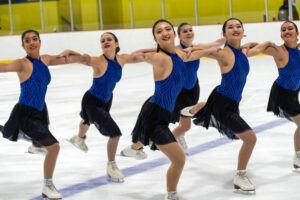 Lei Lei (second from right) skating with her teammates in the December 2019 competition