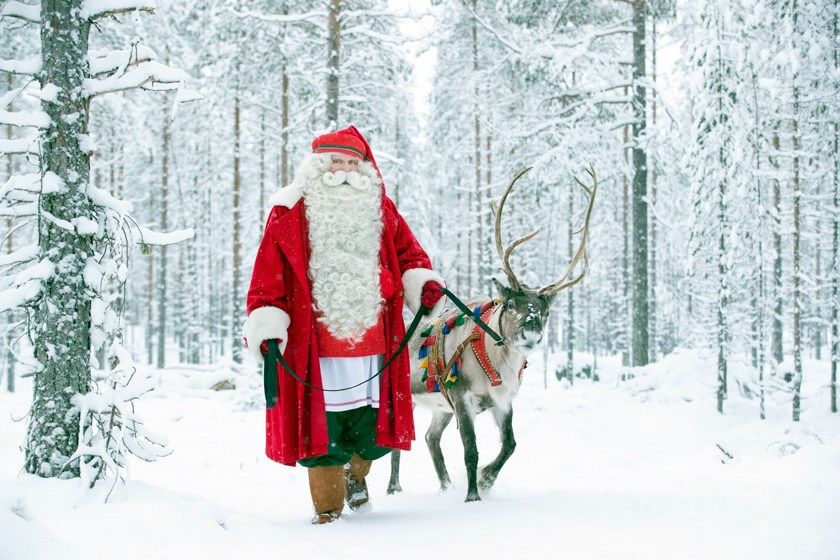 Santa with his reindeer in his home town of Rovaniemi, Lapland Credit: ©Visit Rovaniemi