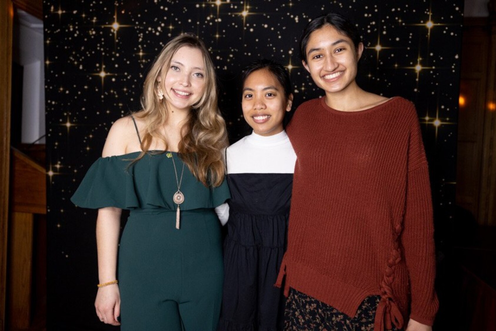 Alora Cisneroz ’23 reuses her high school prom dress, Tricie Linton ’23 wears an outfit she found in the back of her closet, and Malavika Ramarao ’23 wears a dress borrowed from her mom with a sweater borrowed from her roommate