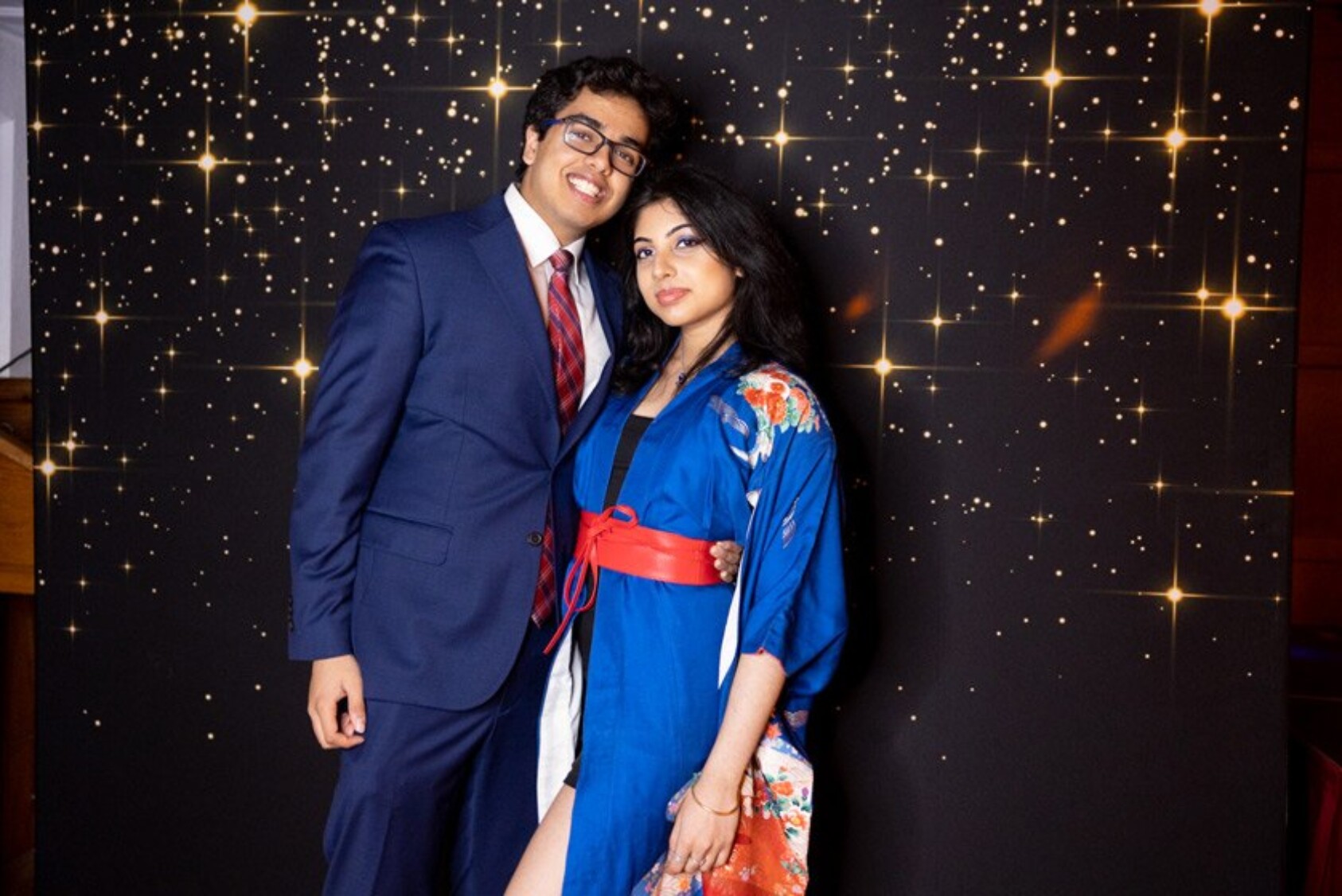 Atharva Barve ’25 in a hand-me-down suit from his older brother and Trisha Beher ’25 in a vintage kimono
