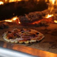 pizza in a brick oven