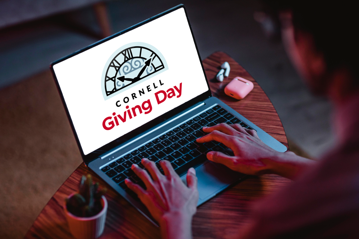 laptop screen with Giving Day logo