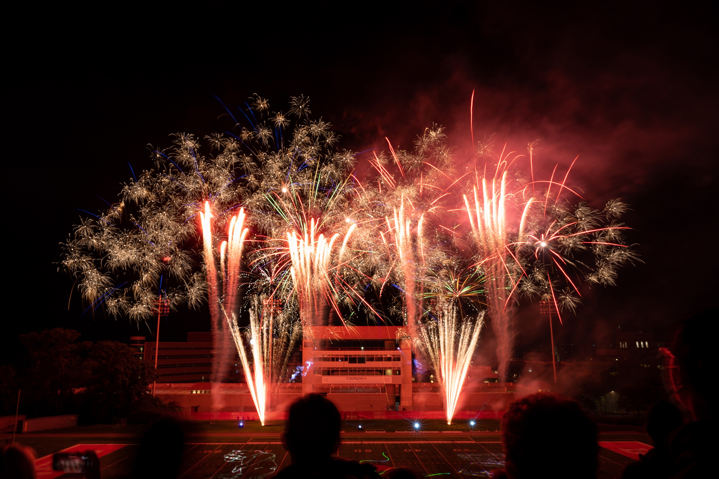 fireworks light up the sky Alumni, parents, and friends