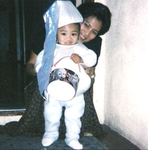 Matthew dressed as a Hershey’s Kiss for Halloween with his grandmother