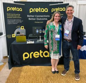 Michael at a recent symposium on addiction disorders with Eliza Foltz, Pretaa’s chief revenue officer, who is currently in her third year of recovery.