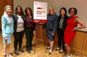 Cynthia, second from left, poses with five other panelists during Weill Cornell Medicine Diversity week.