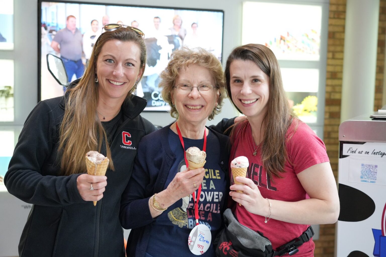 Alumni dash to the Cornell Dairy Bar at Reunion Alumni, parents, and