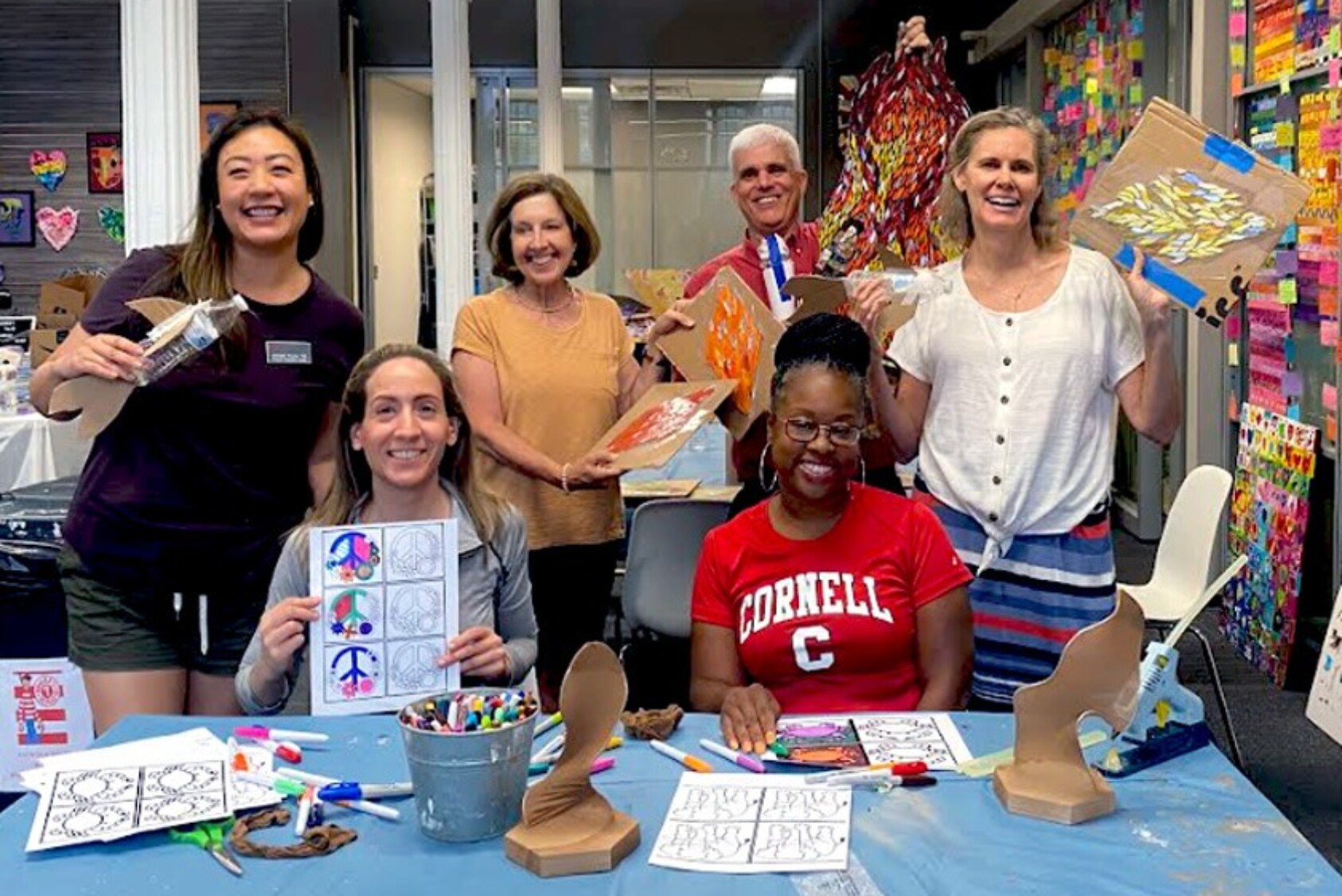 The Cornell Club of Maryland volunteered with Art with a Heart to help color Pop Art for their social enterprise store and to create mosaics for Catholic Charities’ 100th-anniversary project to enhance the Baltimore community through visual art.