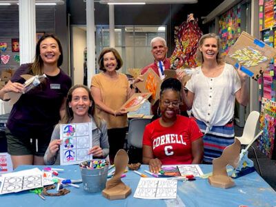 The Cornell Club of Maryland volunteered with Art with a Heart to help color Pop Art for their social enterprise store and to create mosaics for Catholic Charities’ 100th-anniversary project to enhance the Baltimore community through visual art.