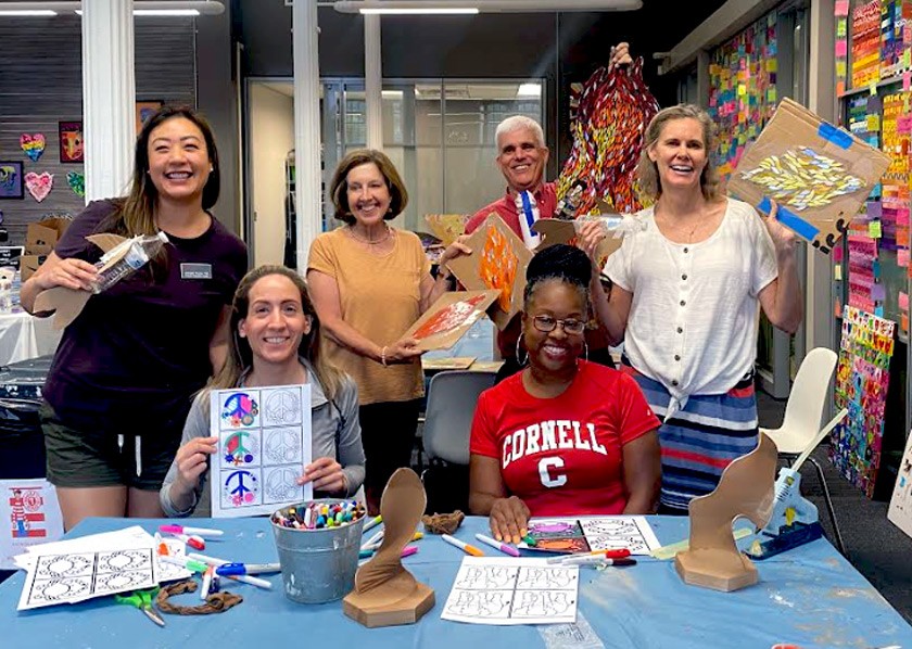 The Cornell Club of Maryland volunteered with Art with a Heart to help color Pop Art for their social enterprise store and to create mosaics for Catholic Charities’ 100th-anniversary project to enhance the Baltimore community through visual art.