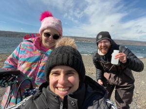 Nicole and her students, Hunter Jamison (PhD student) and Sarah Kolodny ’24, collect lake water samples during a chilly winter field campaign of the Finger Lakes, in February 2023.