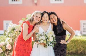 Katia Lin ’14 (right) with Emily Ruggeri ’14 (left) and Catherine Li ’14 (center) at Catherine’s wedding to Jonathan Loke ’14 in Portugal in 2022