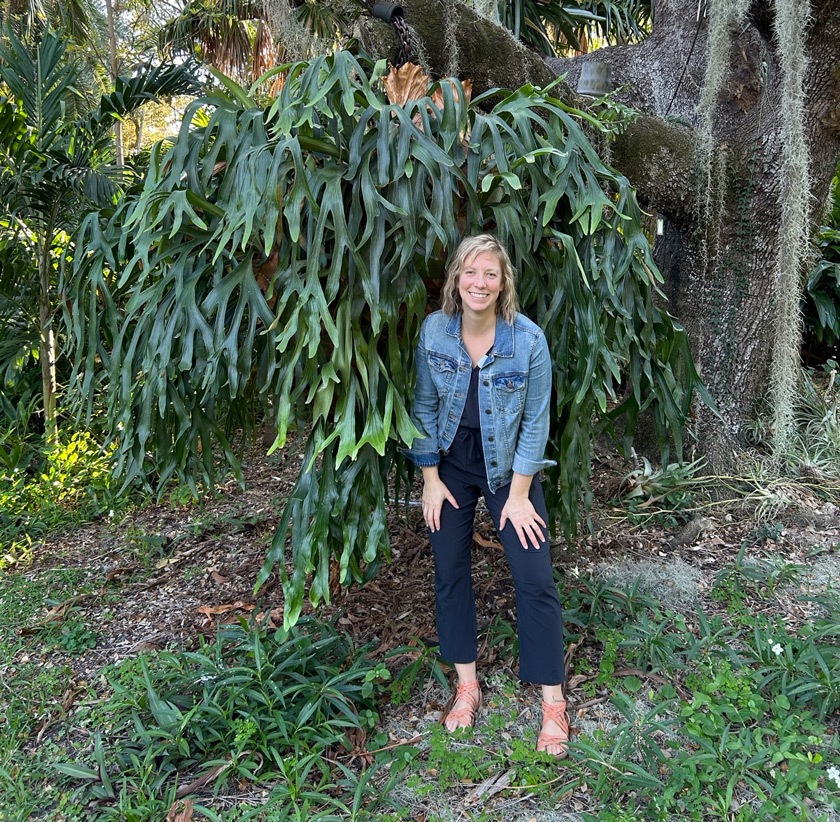 Emily under an impressive staghorn fern (Platycerium sp.) at The Kampong in Coconut Grove, FL