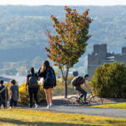 Students head toward west campus on a warm fall day.