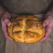 Hands holding Irish soda bread