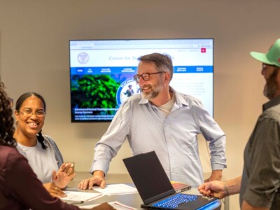 Steve Jackson (center), vice provost for academic innovation, meets with members of the Center for Teaching Innovation team: (from L to R) Adara Alston, Leslie Williams, and James Whalley.