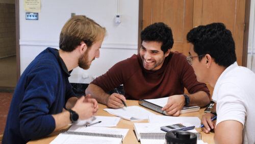 A small cohort of undergraduates collaborate on an assignment in Professor Ashim Datta's food physics and engineering class, applying concepts in real-time.