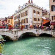 A bridge over water in a quaint French town