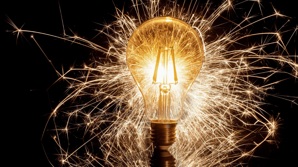 lightbulb with sparkles in the background