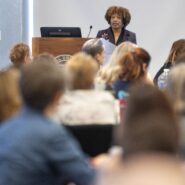 Dr. Michell Chresfield, Assistant Professor, Africana Studies and Research Center delivers remarks at the Inclusive Excellence Summit in the Statler Hotel Ballroom.