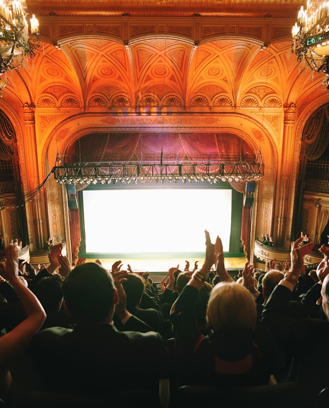 theater audience clapping