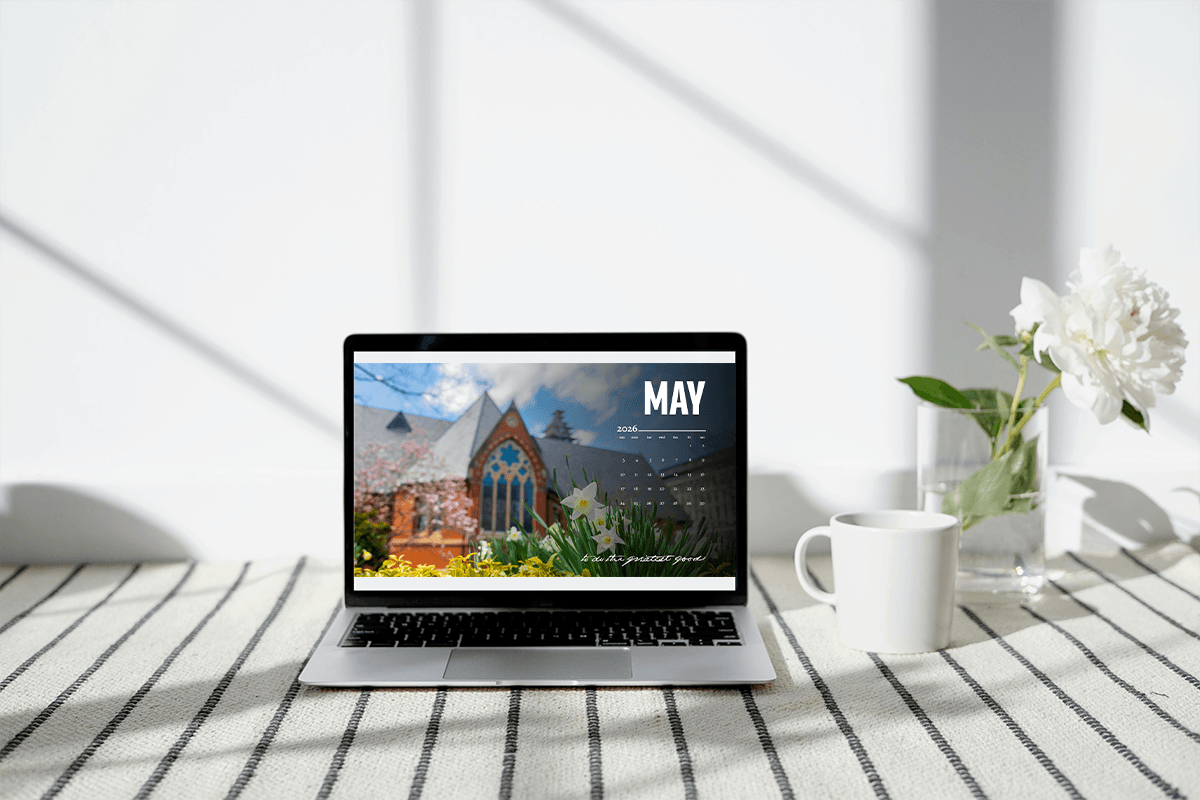 Open laptop with a May calendar background