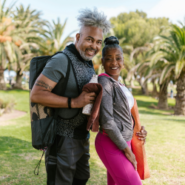 An older couple smiling on vacation
