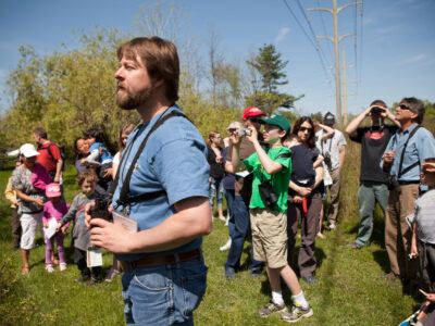 The Cornell Lab of Ornithology marks the return of migratory songbirds to the region with a Migration Celebration May 12. The family-friendly educational event included guided bird walks, interactive exhibits, live birds, games, hands-on activities for children, and learning about bird migration and conservation.