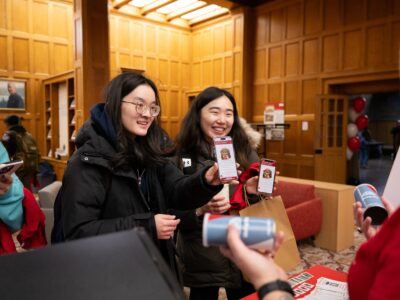 Students showing that they had completed the digital Giving Day scavenger hunt on their phones.