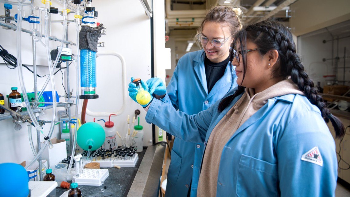 Amaya Garnenez works with Lejla Camdzic, right, in the Stache Lab.
