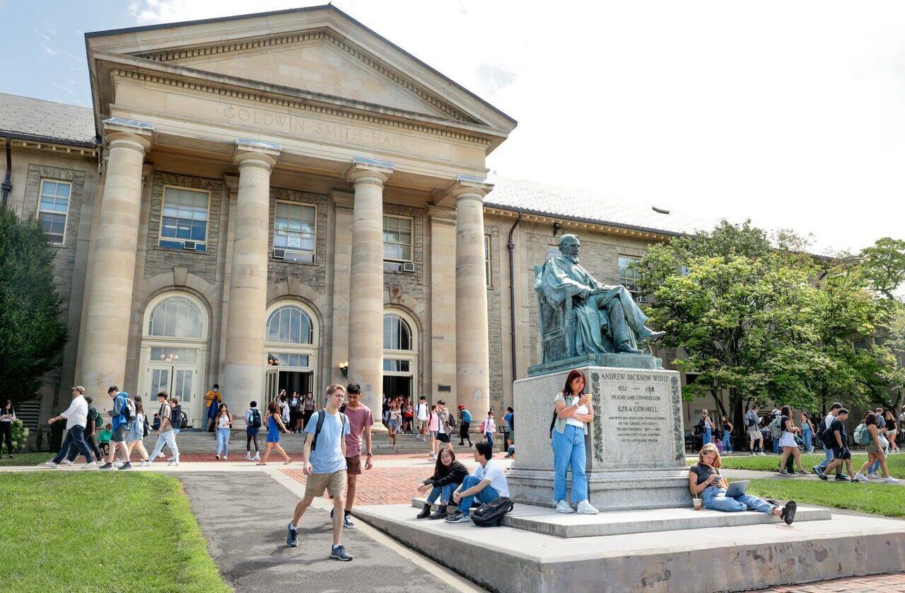 Students are seen in between classes on on the Arts Quad on the first day of Fall Semester.