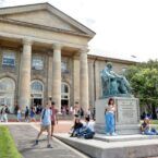 Students are seen in between classes on on the Arts Quad on the first day of Fall Semester.