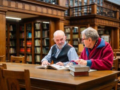 Men in library