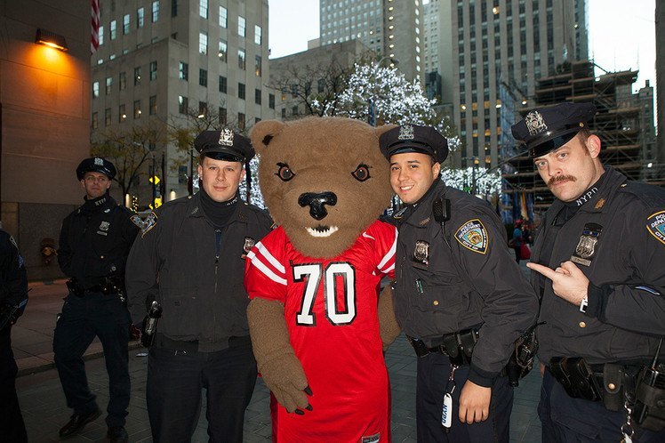 Touchdown the bear with NYPD police officers