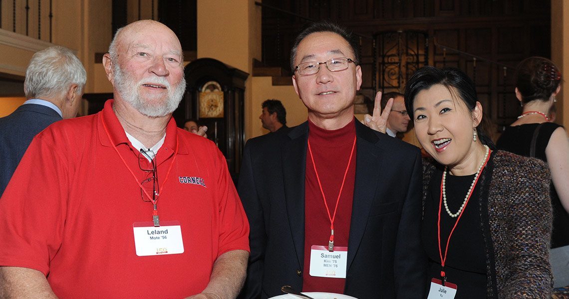 Leland Mote ’56, Samuel Kim ’75, MEng ’76, and Julie Yu enjoy a classy reception. 